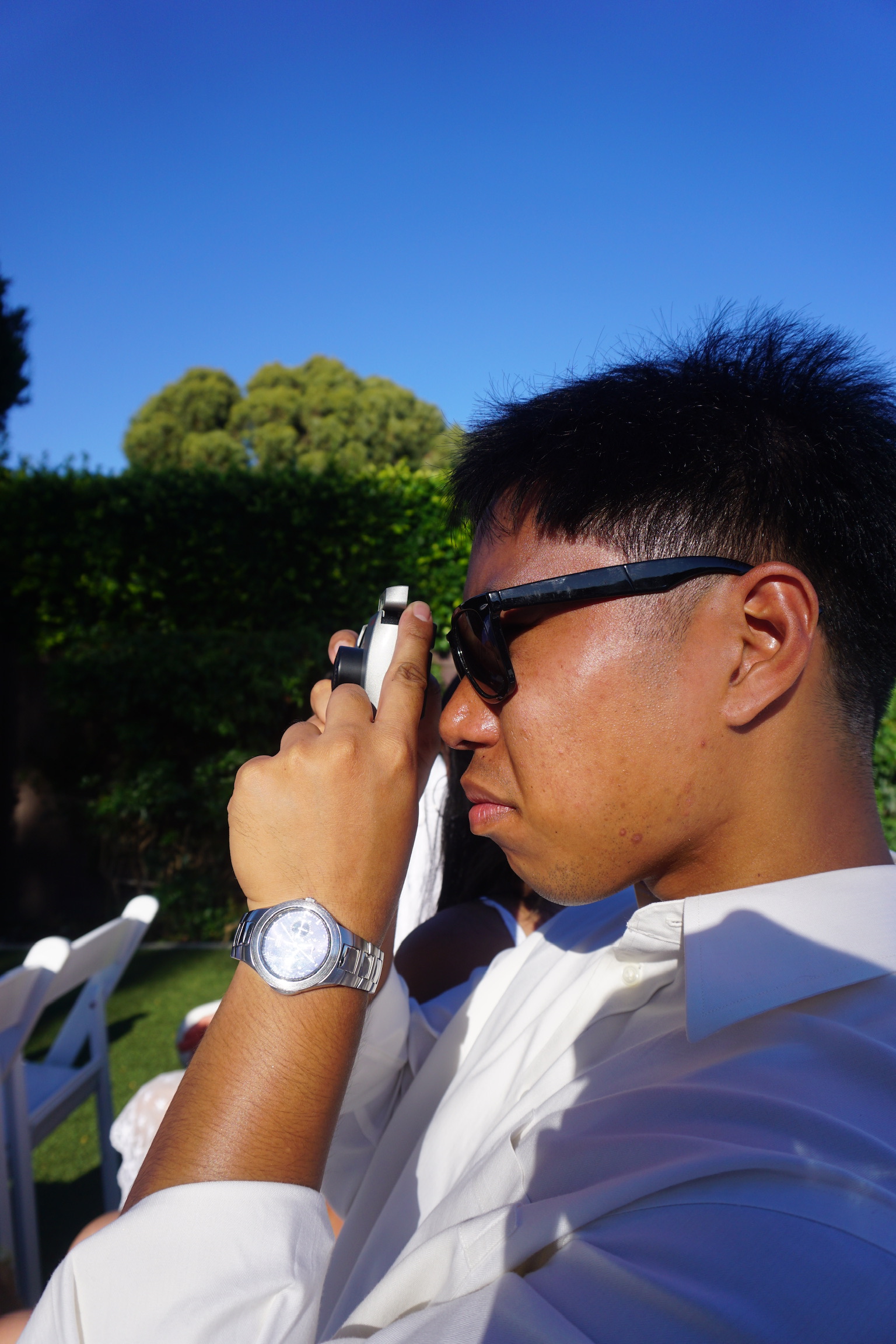 Jude taking a photo with a digital camera